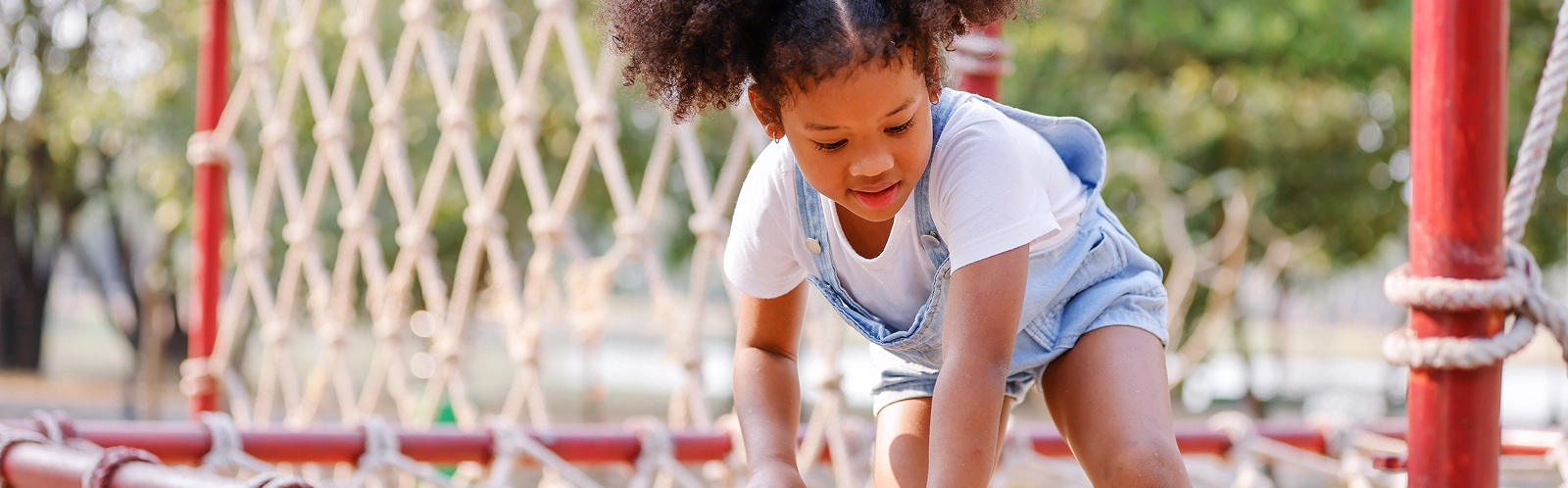 boy-playing-slide-playground