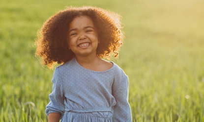 cute-african-baby-girl-field-sunset 1