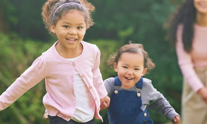 family-garden-children-running-with-parents-fun-game-with-love-support-care-outdoor-lawn-backyard-nature-with-baby-mom-dad-with-bonding-weekend-activity-park-walk 1