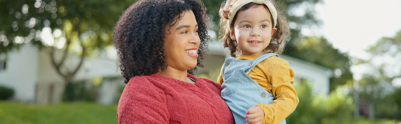 family-kids-mother-with-her-adopted-daughter-garden-their-foster-home-together-love-smile-children-with-stepmother-holding-her-female-child-outdoor-home-backyard (1)
