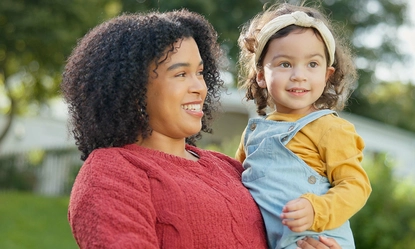 family-kids-mother-with-her-adopted-daughter-garden-their-foster-home-together-love-smile-children-with-stepmother-holding-her-female-child-outdoor-home-backyard (1)