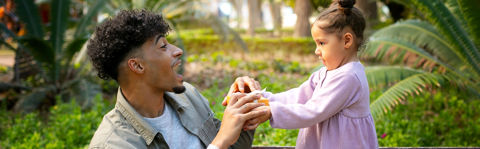father-spending-time-with-his-daughter-outdoors-father-s-day 1