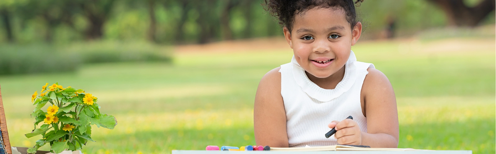 happy-family-enjoying-picnic-park-girl-are-having-fun-drawing-paper-placed-table