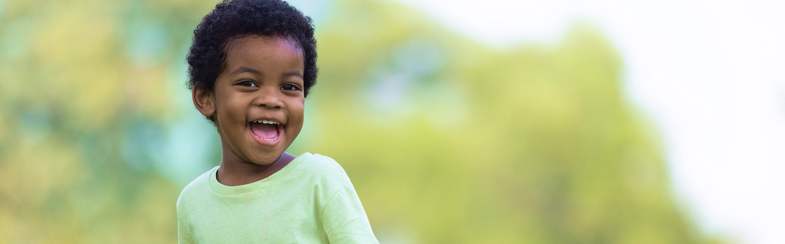 portrait-young-man-standing-against-sky 1