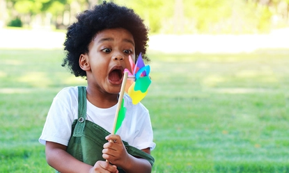 portraits-boys-playing-wind-turbine-park-joyfully-happily-summer 1
